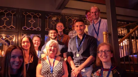 A group of winning tutors gather together