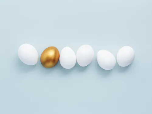 six eggs, five are white shelled, one is golden